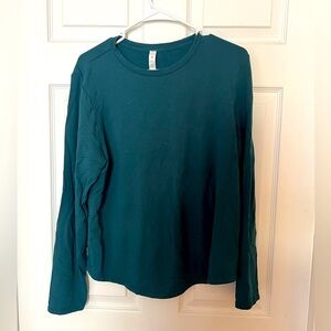 Long sleeve turquoise Lululemon love fleece shirt. Used size 12